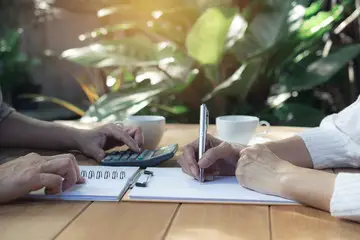 Two people at a meeting